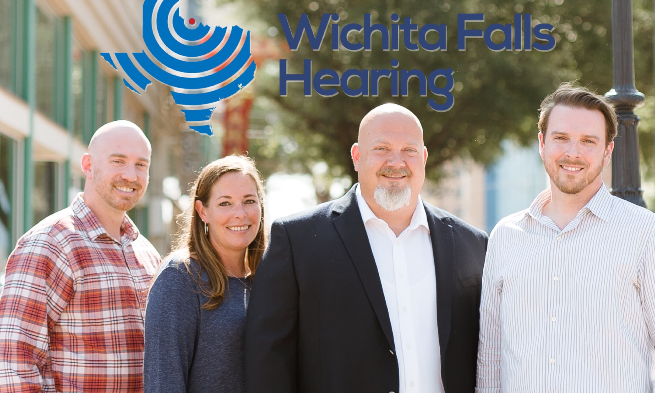 The Wichita Falls Hearing team standing together outside their clinic.